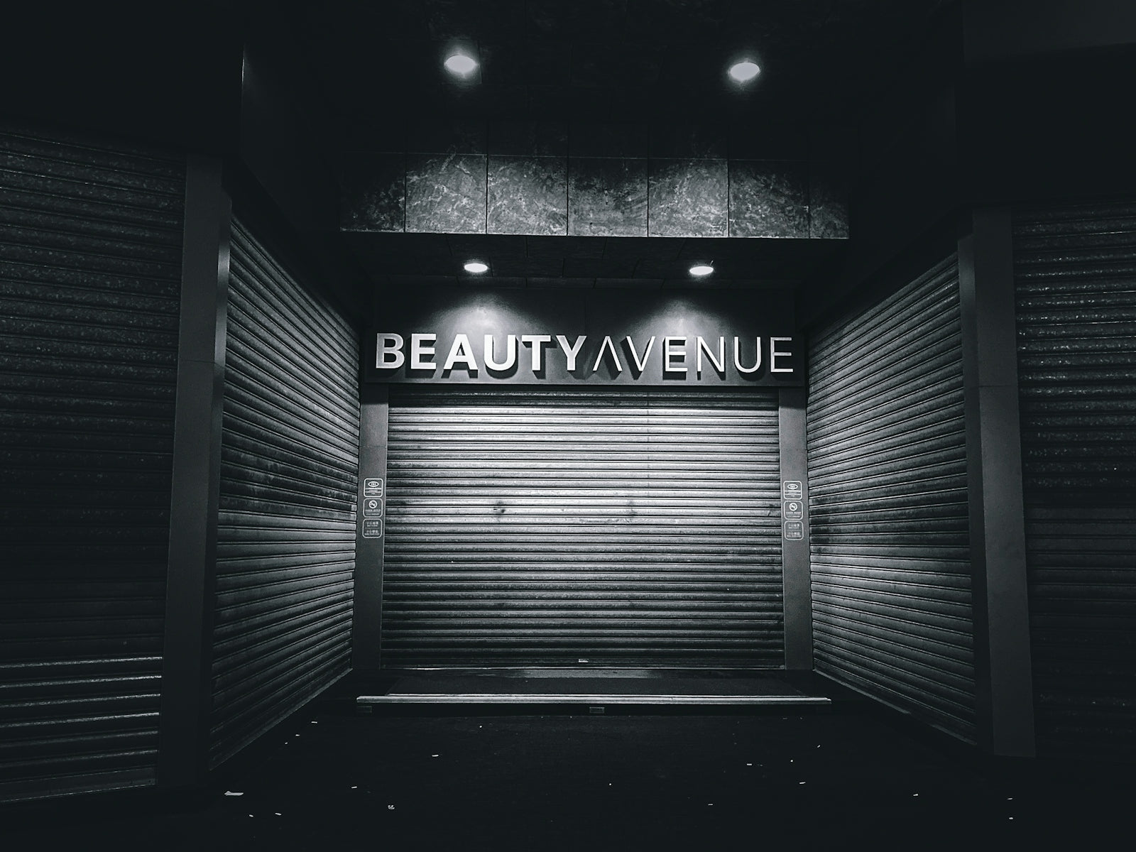 a black and white photo of a closed storage unit