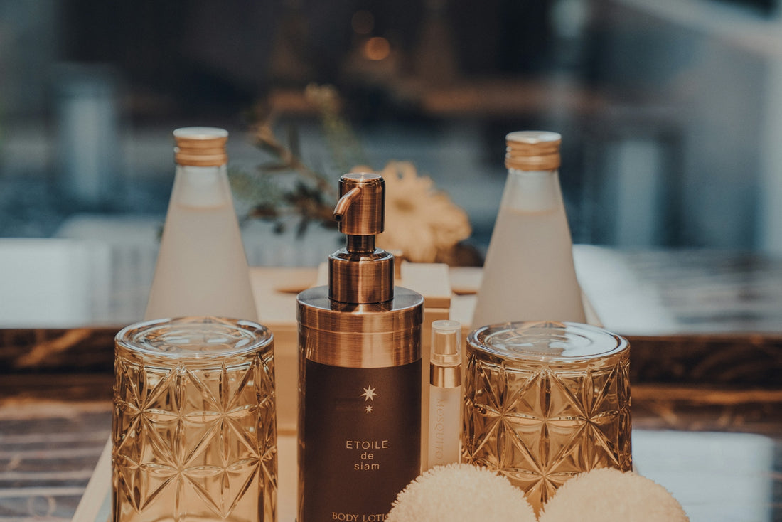 a bottle of perfume sitting on top of a table