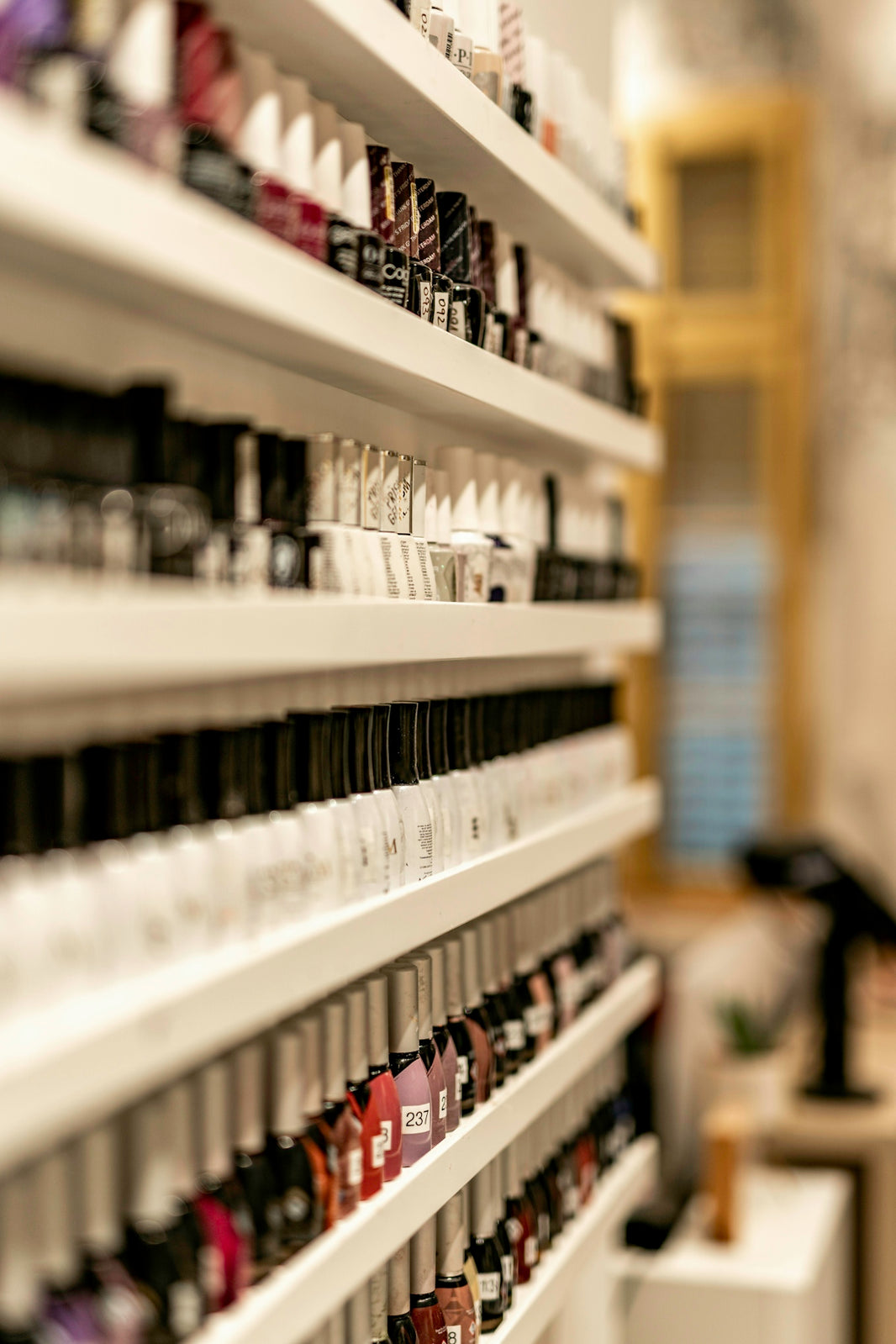 a store shelf filled with lots of bottles of wine