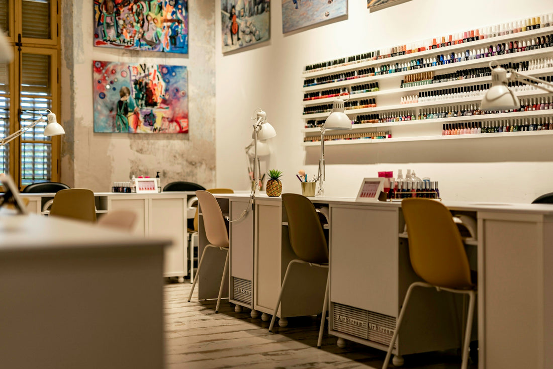 a nail salon with chairs and a counter