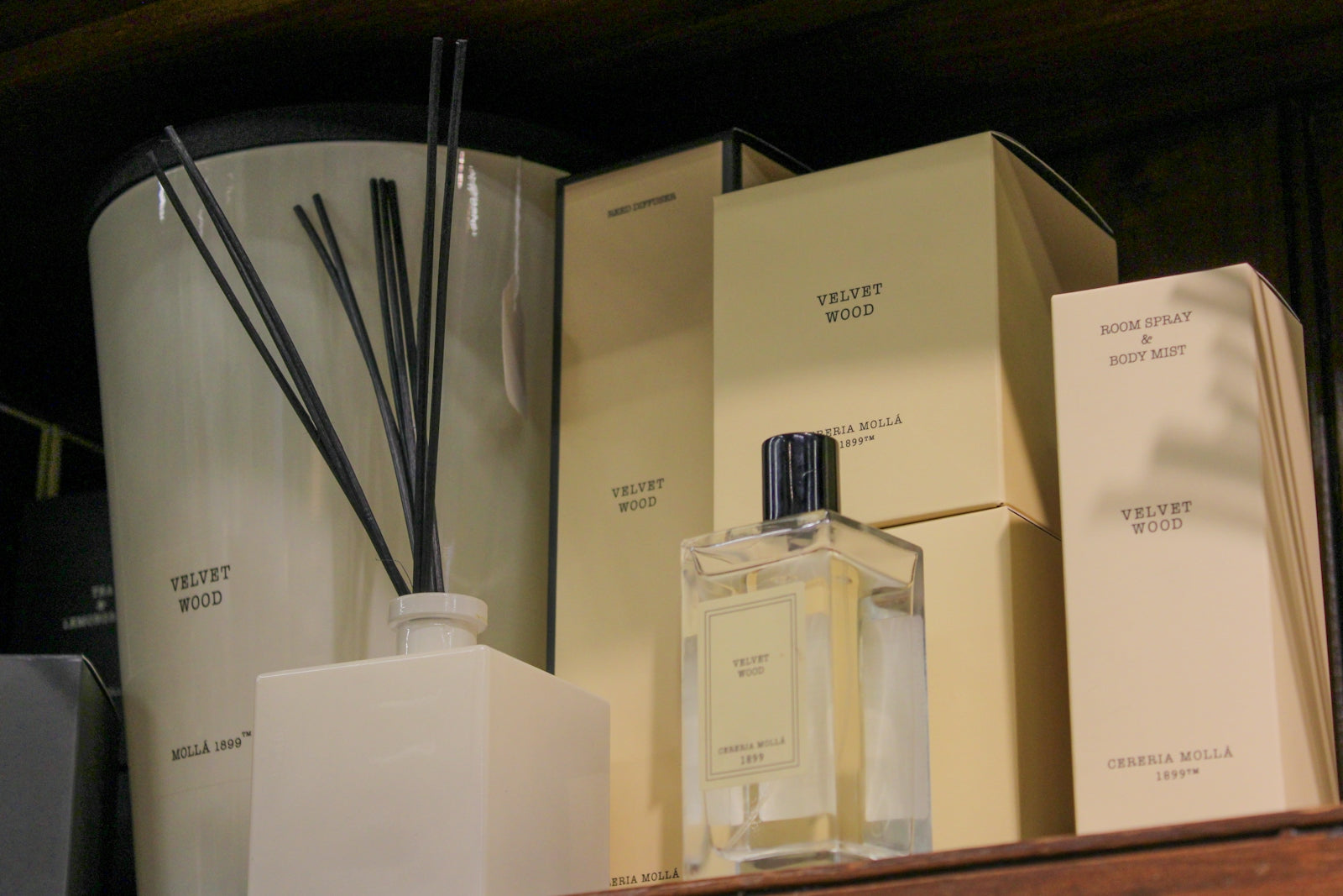 Perfume bottle and reed diffuser with boxes.